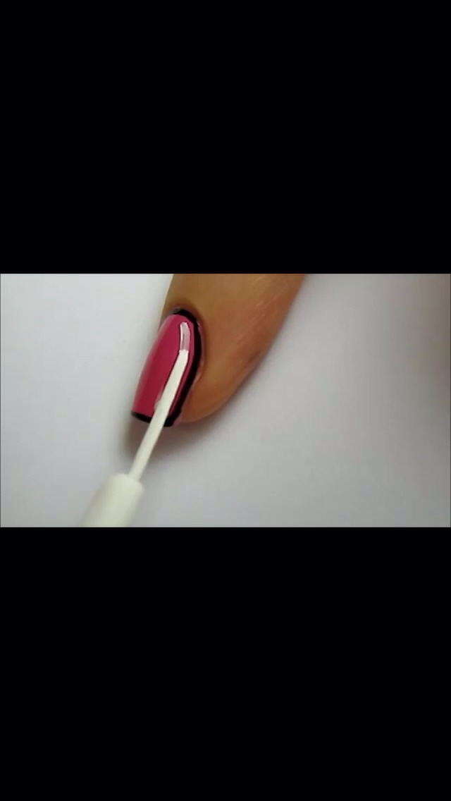 Add  a white line with nail art brush connecting it to the dot