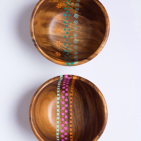 Painted Wooden Bowls. 
Give plain wooden bowls a modern touch with Martha Stewart Crafts Multi-Surface Paint and adhesive stencils! You can often find vintage wood bowls at thrift stores for as little as $1 each. Then follow the full step-by-step tutorial.