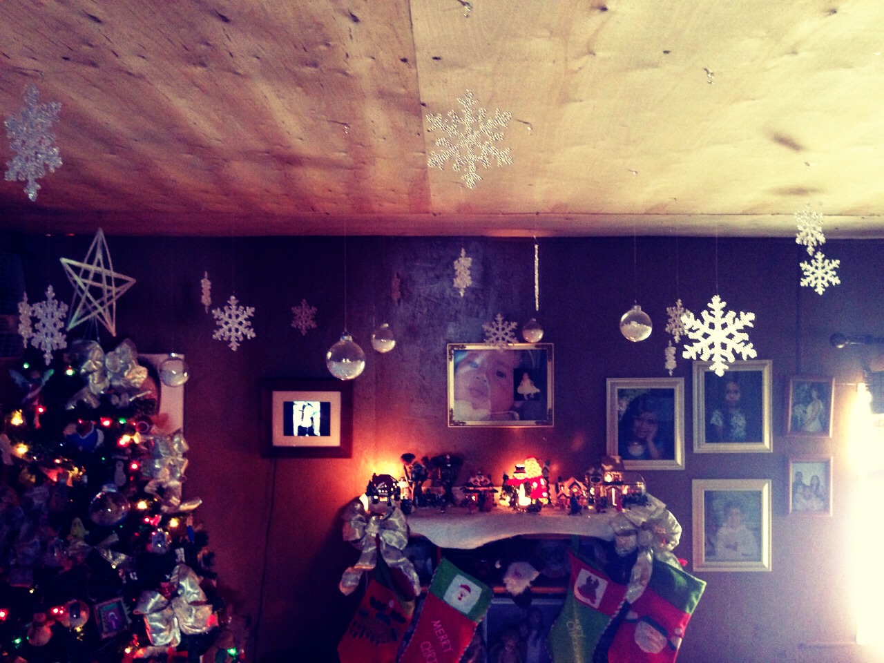 hang icicles off the ceiling .. got some at the 99¢ store and the dollar tree store .. i also hung clear bulbs .. i added snow flakes from big lots .. i use fishing string and clear tacks. 