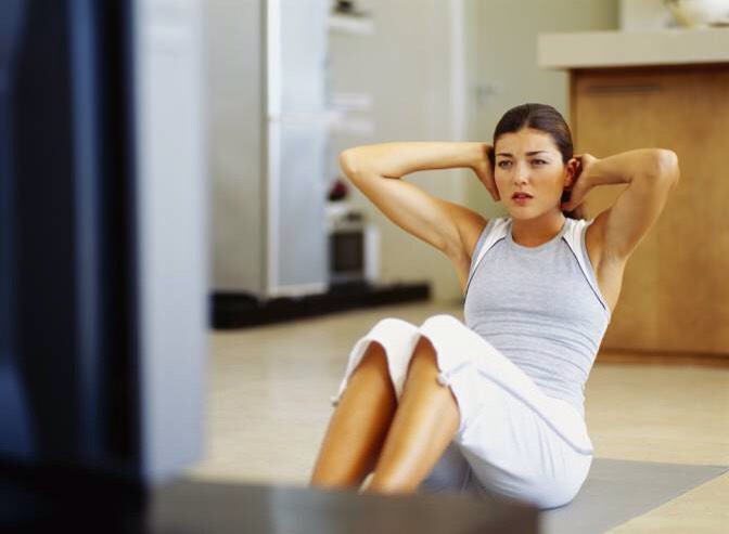 6. Exercise During Commercials 
Get moving during commercials. Skip, dance, go up and down some stairs, run in place, anything that gets your heart rate up so you feel somewhat breathless, says Geralyn Coopersmith, senior national manager at Equinox fitness. Do it for each 2-minute break  during 