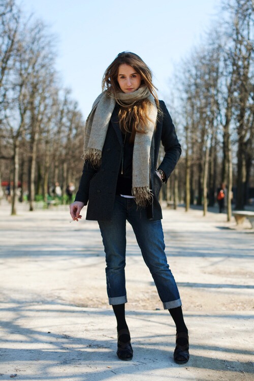 Don't wear jeans or street pants. Denim is not waterproof, so water will soak through and you'll end up cold, wet and miserable.

Skin tight jeans won't allow you to retain any of your body heat! You'll be frozen after 5 minutes. :(
