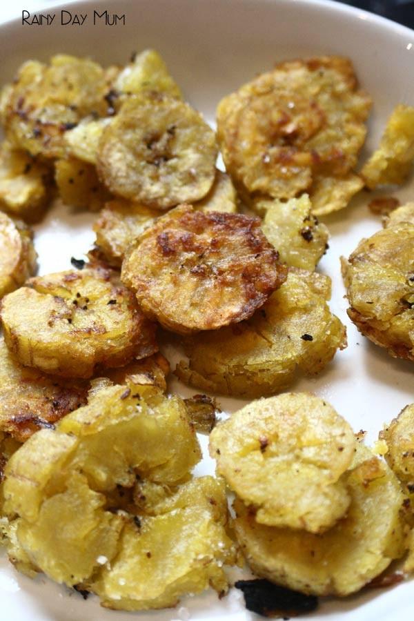 Check that both sides are browned, then take them out, and place on some paper towel to remove the oil.  Sprinkle the fried plantain slices with salt. You could also add paprika or chilli flakes depending on your taste preferences. I like mine plain, and so it turns out, do the kids.