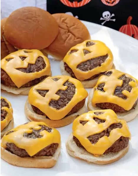 Cut some scary or funny faces into your cheese and let them melt over the burger 😁
