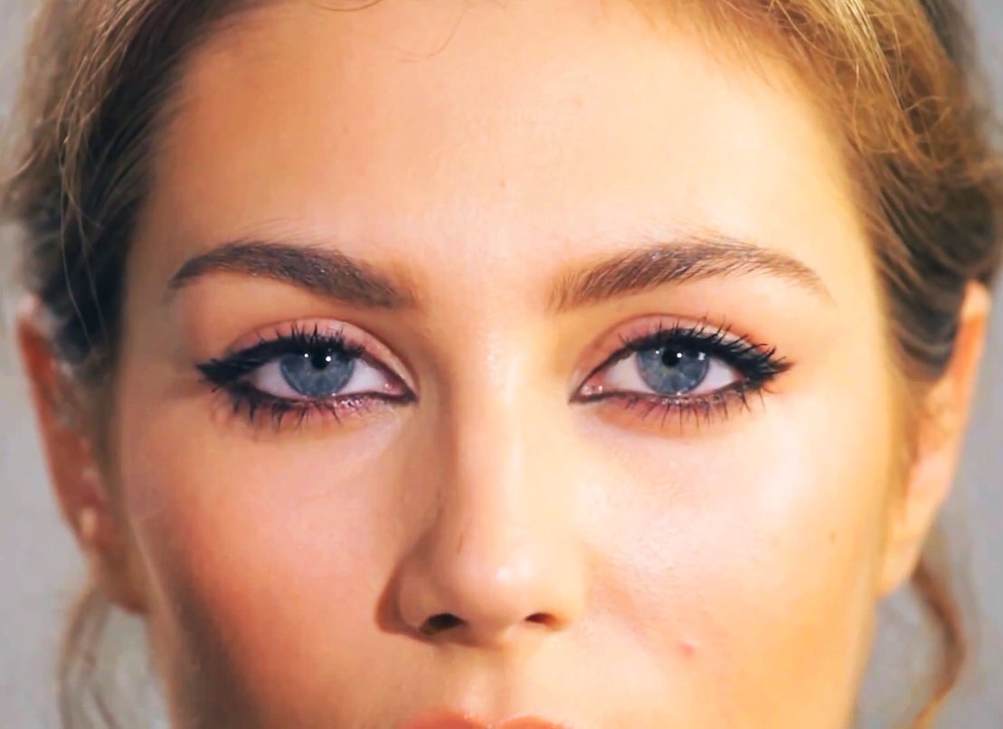 Don't line the inside of your eyes. Lining the inside of your eyes will make them appear smaller and closer together. Stop about half way and blend out. A good drug store eye liner is Almay Liquid Liner. 
