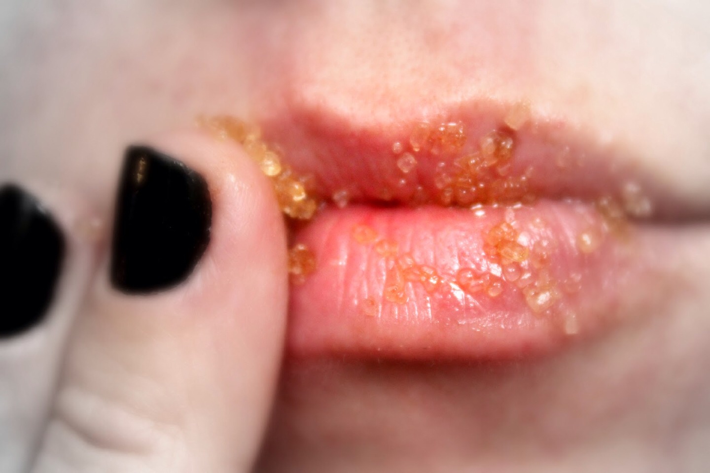 Scrub lips with finger until all of your dead skin is off