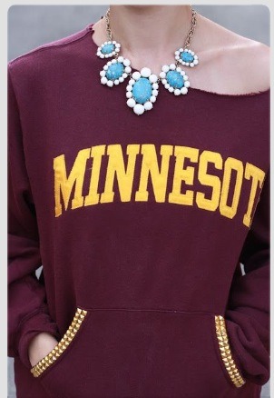 Cut off the hood/neckline and add some studs around the pocket! Custom college sweater
