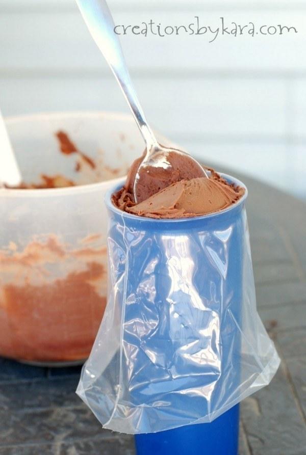 Fill up your frosting bag easier by folding it over a cup.