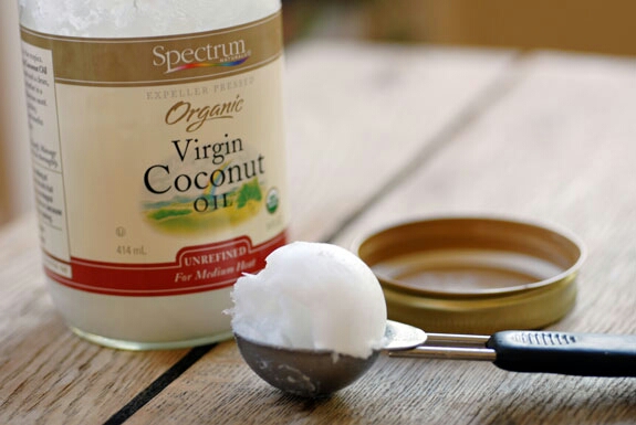 Add 1/2 tsp of coconut oil to the container, allow it to melt.