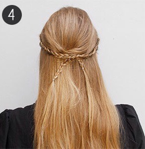 4. Secure the braid in the back in the same place you secured your backcombed hair earlier. Repeat on the other side.