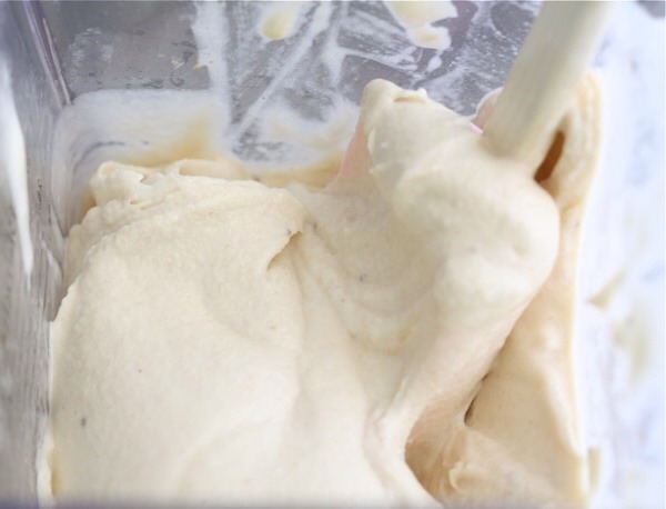 When the bananas are smooth and creamy, add in the peanut butter and blend the mixture one more time.