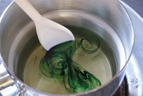 When your wax is melted allow it to cool before adding colours and fragrances! 
Wax purchased in craft stores will usually come with a guide that recommends an ideal temperature for adding fragrances, ensure the temp. Is not too high as some fragrances can loose their scent when added to high temps.