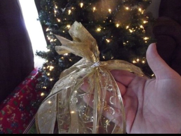 Depending on the size of your tree you will need 6 to 8 pieces of ribbon cut about twice the length of your tree. For example, if you have a 6 foot tree, you will want to cut 6 pieces of ribbon 12 feet long. If you have a slender tree then 6 pieces will be plenty. 