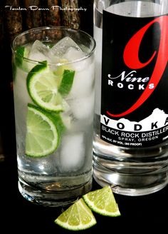 A TOP SHELF VODKA! Either or since both are pretty much clear and less likely to cause hangovers! This drink is made with one of the best new vodkas, 9 Rocks, with water and some limes on the rocks (ice). MAKE SURE mixed drinks are on the rocks--the water will extend the time you drink slowly!
