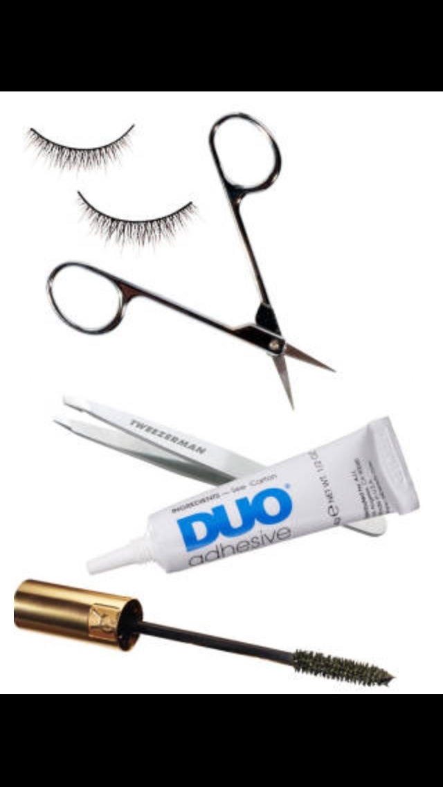 FAUX LASHES
Step 1: Trim each end of the lash strip as needed for a proper fit.


Step 2: Use a tiny brush to paint glue onto strip edge; let set for a few seconds to become tacky and prevent sliding on lid. Try MAC DUO Adhesive for Falselashes


Step 3: Grasp the center of the falsies with tweezers and press the strip into the base of your natural lash line. Try Tweezerman Stainless Steel Slant Tweezers


Step 4: Let glue dry for a minute, then finish with coats of mascara to blend real and false lashes.