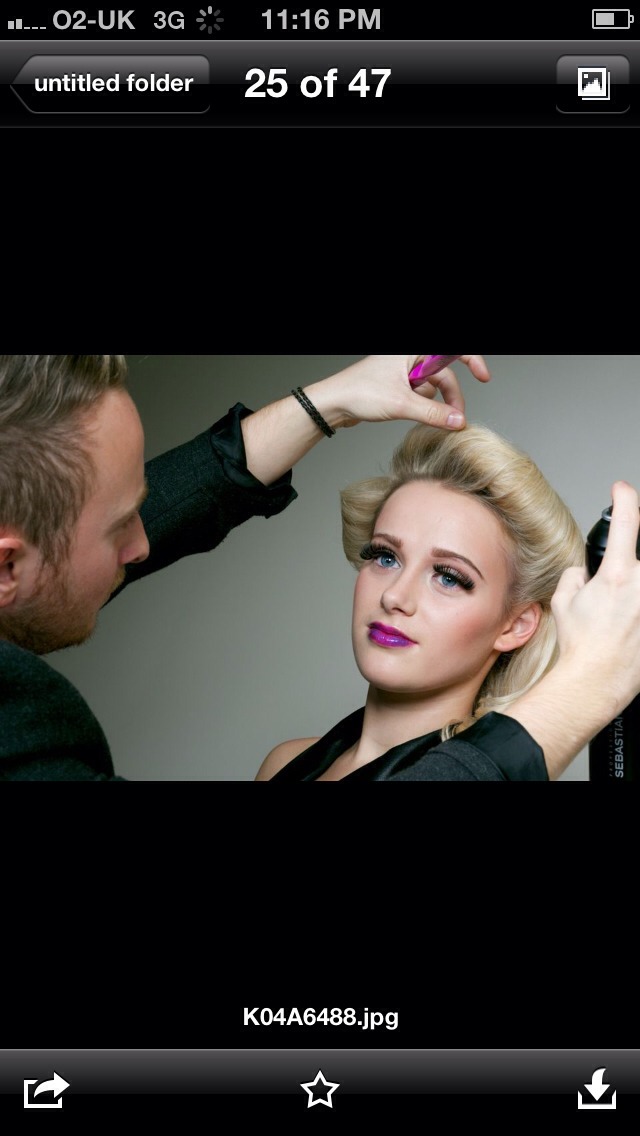 Using a toilet roll wrap the hair around an empty toilet roll and when hair is pinned into section you like spray into place using firm hairspray and then remove roll !