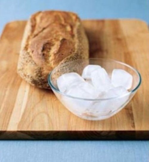 Rub an ice cube over stale bread, then bake for 12 minutes to revive it.