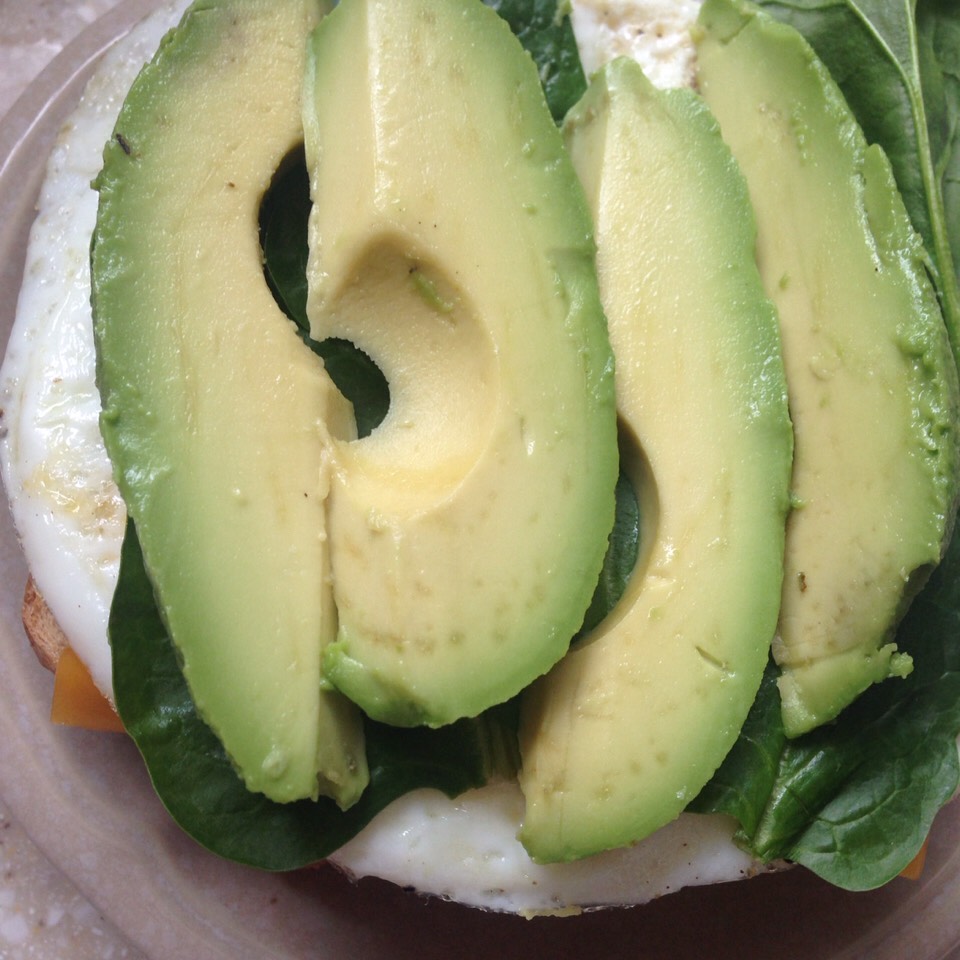Next, prepare and wash your spinach and cut up your avocado into slices. 
And top it off. 
If you wanted to add a dressing you could try plain greek yogurt!