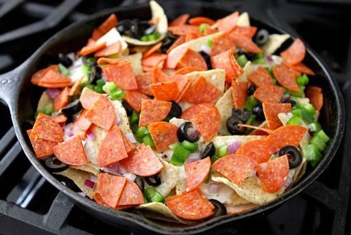 Step 9: Top with the onions, pepperoni, olives, and bell pepper.