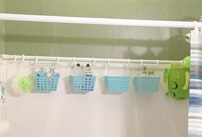 Another “mini-crate” idea. Add a 2nd shower rod to hang all those extra shower & bath items. If you really want to go crazy with shower rods, you can add one to dry towels and swimsuits, too.