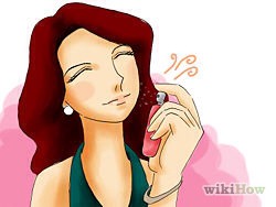 Spray a light spritz of perfume. Perfume can have a draw a guy in close, but if you splash too much on, you will only end up pushing him away. The idea is to where enough perfume to catch someone's attention and draw them in closer for a better sniff.