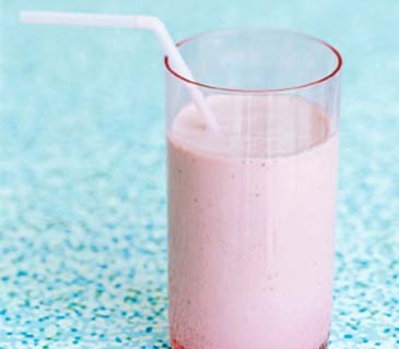 In a cocktail shaker, combine a packet of vanilla or strawberry instant-breakfast powder (look for the no-sugar-added kind, such as Carnation) and 1 cup of low-fat strawberry cow's milk or soy milk.