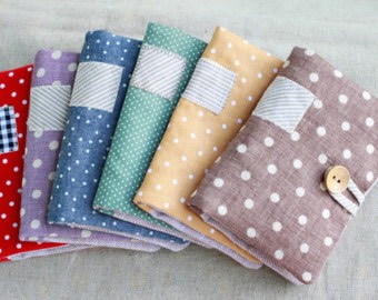 These cute little purse-like things are actually tampon bags! Never ever have a bag without them, getting caught short can often be both embarrassing and pricy! 