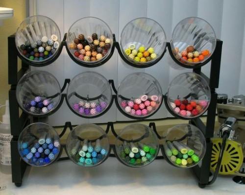 Put some cups in a wine rack, and you have an instant storage solution for brushes, pencils and lipsticks.