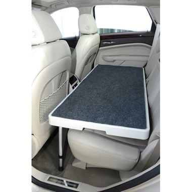 4. Reduce dog anxiety while riding in a car by installing a stable car seat.