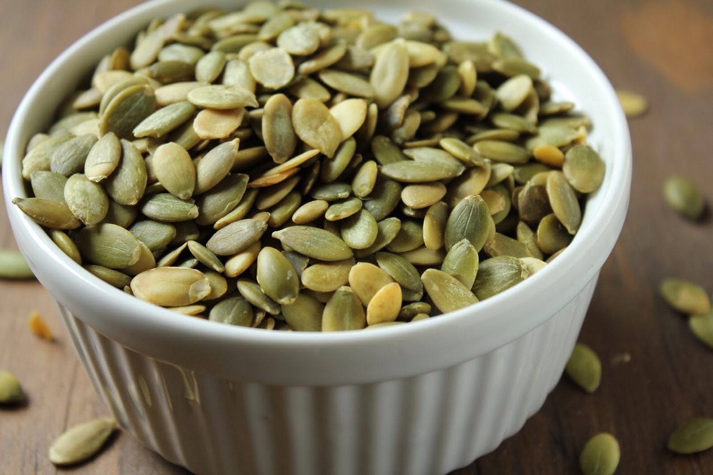 Eat pumpkin seeds on a daily basis. Pumpkin seeds are high in protein which will strengthen your hair and quicken growth. They are also great for nail health and growth!