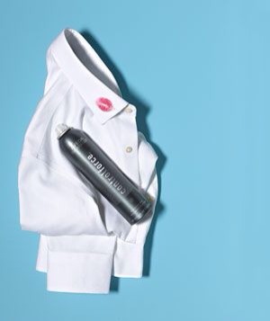 Kiss that smudge of Really Red good-bye. If the fabric is machine washable, saturate the spot with hair spray, let it sit for 10 minutes, then dab with a damp cloth or sponge to remove. Launder as usual to wash out any residual stain and spray.
