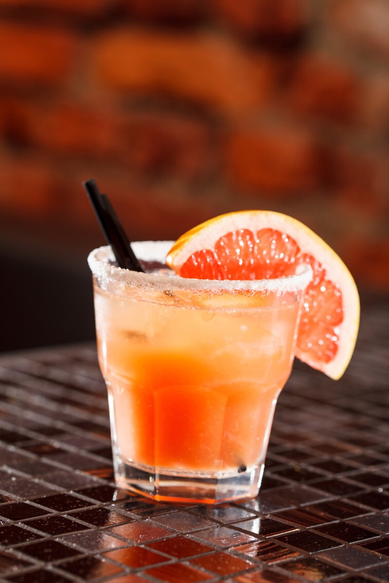 Grapefruit Margarita 
A grapefruit margarita is a tart twist on a traditional tequila drink. This spring cocktail recipe is also figure friendly due to the low sugar content. That makes it ideal for a bridal shower. It is recommended that you serve this drink in a low-ball glass over ice.