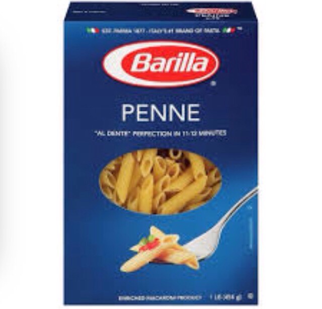 Pour in one box of penne pasta into water and stir often
