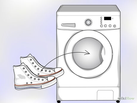 Toss your shoes into the washing machine. Place your white Converse shoes in the washing machine along with a little standard detergent. Run the machine on a full cycle using cold water