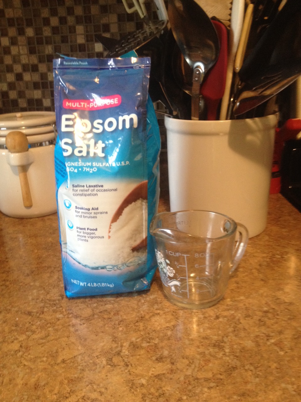 First, pour two cups (or however much you need for your container) of Epsom salt into a fairly small bowl.
