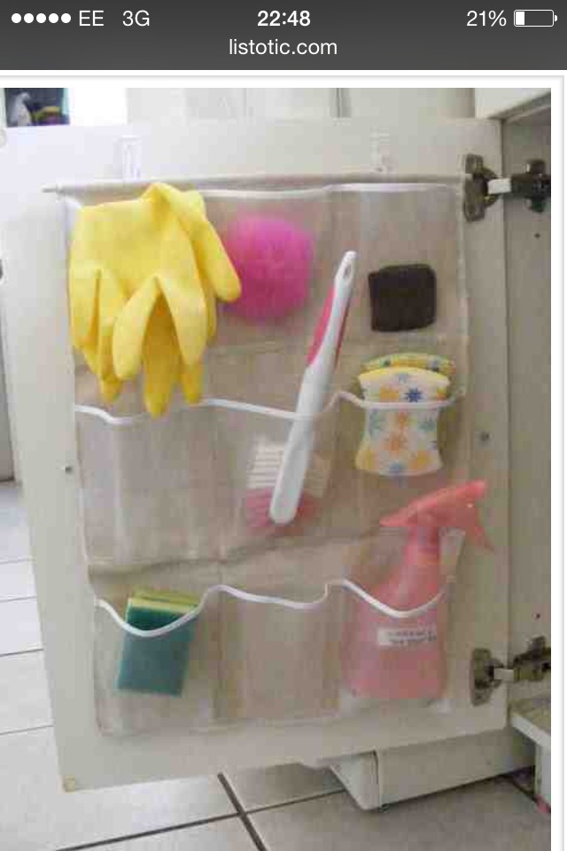 6. Pocket organiser- This is kind of like the idea behind a hanging shoe rack, only made for items kept under the kitchen sink. Love it! Keep your sponges and gloves out of sight to dry off. I also like this idea for the smaller items that tend to get lost under the sink, like the sink plug, etc.