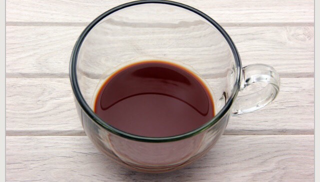 Mix the water and the cocoa powder together to make a syrup-like mixture. Pour this into your mug.