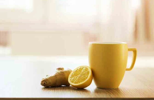 DRINK A DEBLOATING TEA 
Spices like cinnamon and ginger help clear out your system, so have a mug of debloating tea — like ginger (and lemongrass tea) — before you go to bed. Mint tea can also help soothe your stomach, so opt for that if you need a refreshing end to your dinner.
