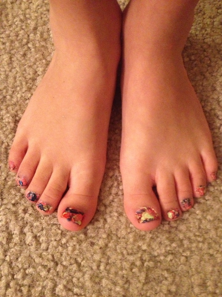 To get it to look like this fun look!! You will need.
-straws
-your preference of nail polish
-news paper
-tape
Pick a base coat paint the nail a solid color then
 Dab the polish tip to one of the ends of the straws. And blow it onto your toe nails or finger nails whichever you prefer.