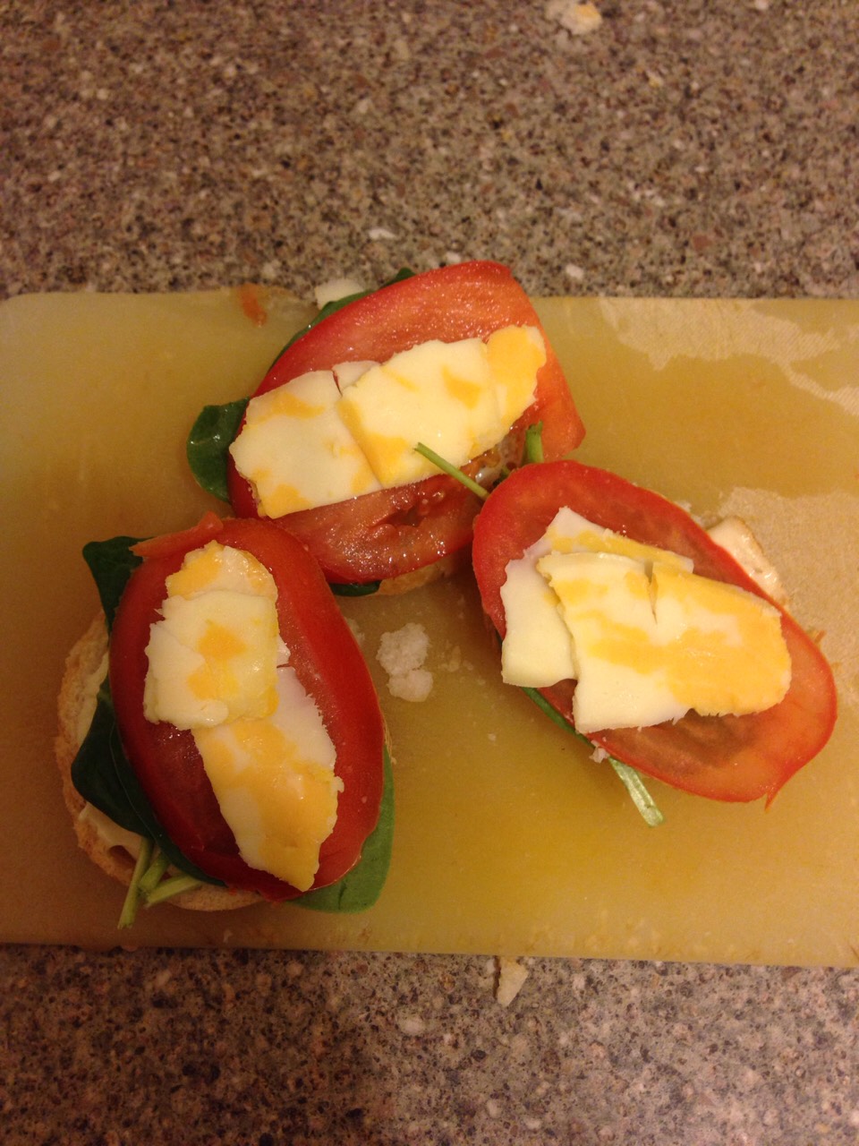 Assemble your cheese, tomato, spinach and baguette.