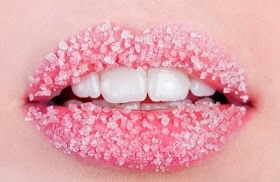 Sugar scrub: Sugar scrub is very beneficial in the treatment of dark lips. Take 3 to 4 table spoons of sugar powder and add butter to it. mix it to form a thick paste and apply it on lips.Sugar works as a exfoliate and remove dead cells on the lips.Butter helps to increase the moisture and color.