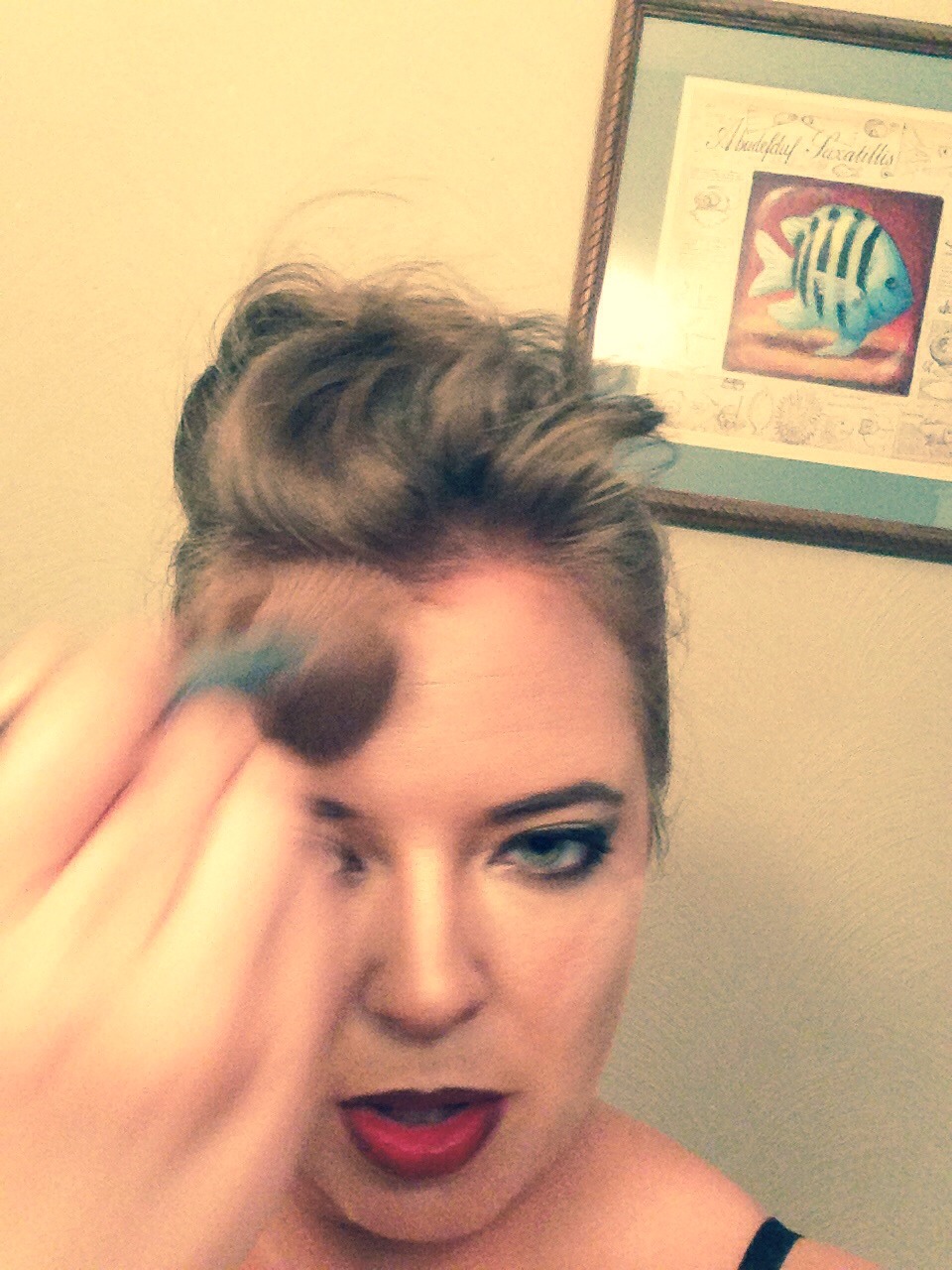 Finish by setting makeup with a loose powder. I used Bare Essentuals Mineral Veil.