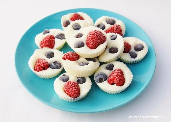 STEP 1
Gather together your ingredients. Lay out approximately 12 cupcake cases or silicone muffin cups on a small baking sheet or tray (this will need to fit in your freezer, so it may be worth checking it for size before you start).