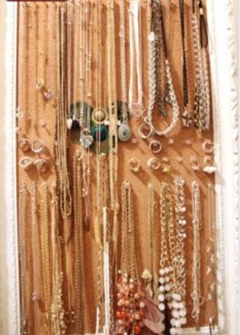 A large cork board full of any jewelry you have! Make it fun and cute with coloured or different shaped tacks 