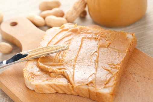 Fat-free Peanut Butter.
With just marginally fewer grams of fat, the same amount of calories, and loads of bad carbs and artificial sweeteners, fat-free peanut butter is one of the worst alternatives on the market. What’s more, the fat in regular peanut butter is unsaturated, the healthier kind!