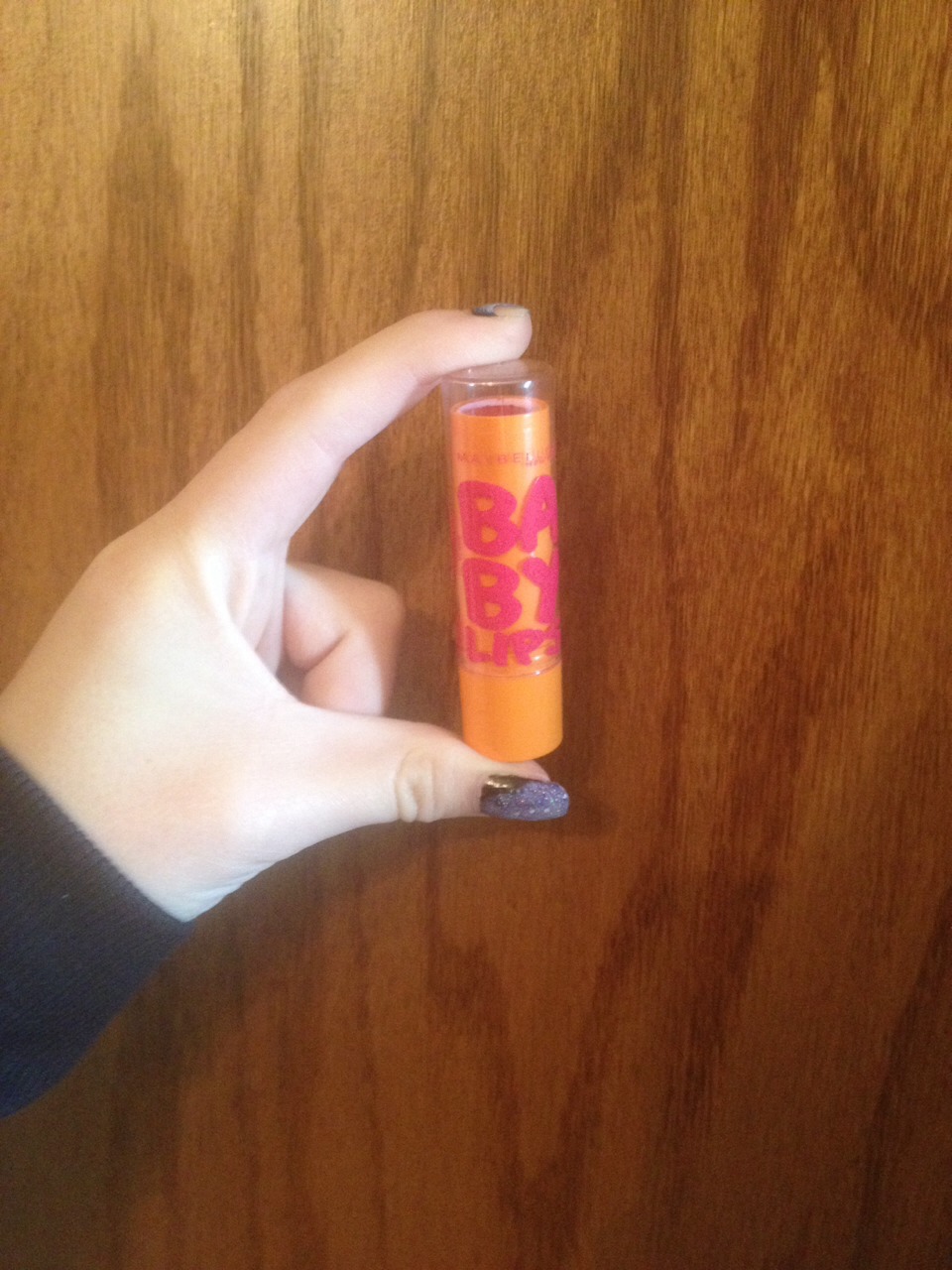 Start off with a tinted red lip balm of any kind!