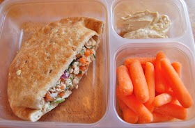 Tuna salad in a pocket thin, carrots, hummus