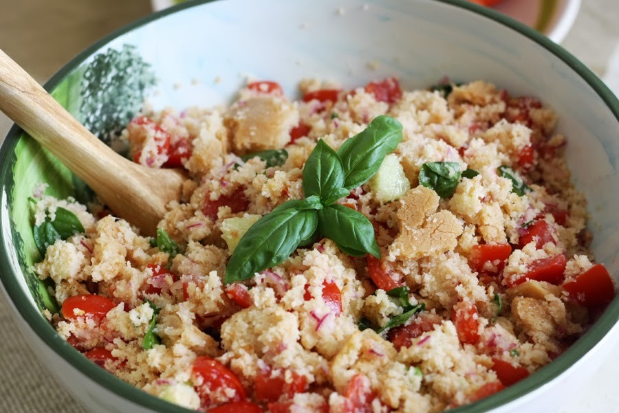 21. Panzanella: Marinate tomato chunks in olive oil, red wine vinegar, garlic, salt and pepper for 10 minutes. Soak stale bread in water for 5 minutes; drain, then toss with the tomatoes. Add sliced red onion, celery and fresh herbs.