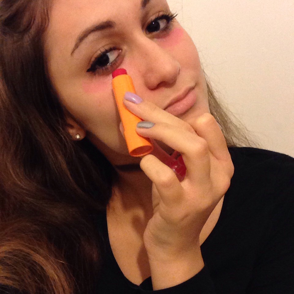 Apply some reddish eyeshadow underneath your eyes OR if you don't have any like I didn't, then you can use some red lip balm (weird, I know but it works!) 