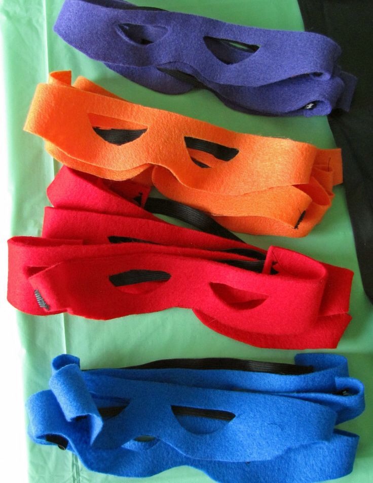 Create masks out of colored felt and elastic. All you have to do is cut out the mask and hot glue an elastic strand to 2 ends