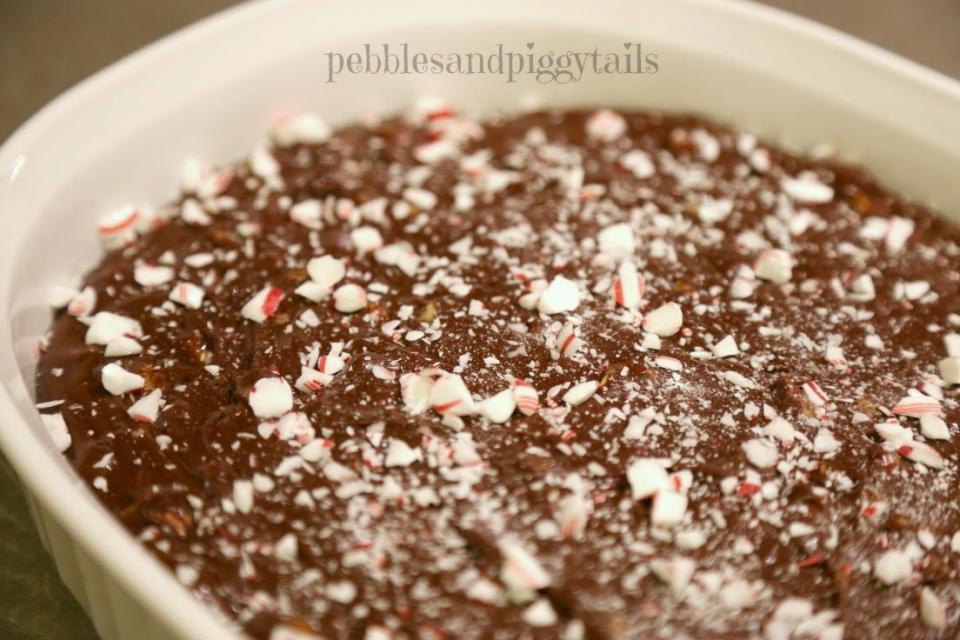 If you want you can add some crushed candy canes on top before it cools. I love to add a little peppermint. Keep in mind, this step may add a minute or two . . . .heehee.